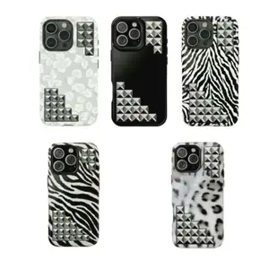 The phone case has a snow leopard print theme with 11-17 rhinestones