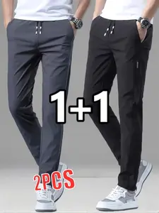 Men’s lightweight straight-leg casual pants, 2-pack. Elastic waistband with adjustable drawstring, side pockets. Breathable, comfortable fabric suitable for casual wear, office, and outdoor activities. Smooth-textured long pants.