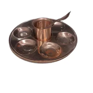 Traditional puja thali plate with jal pot