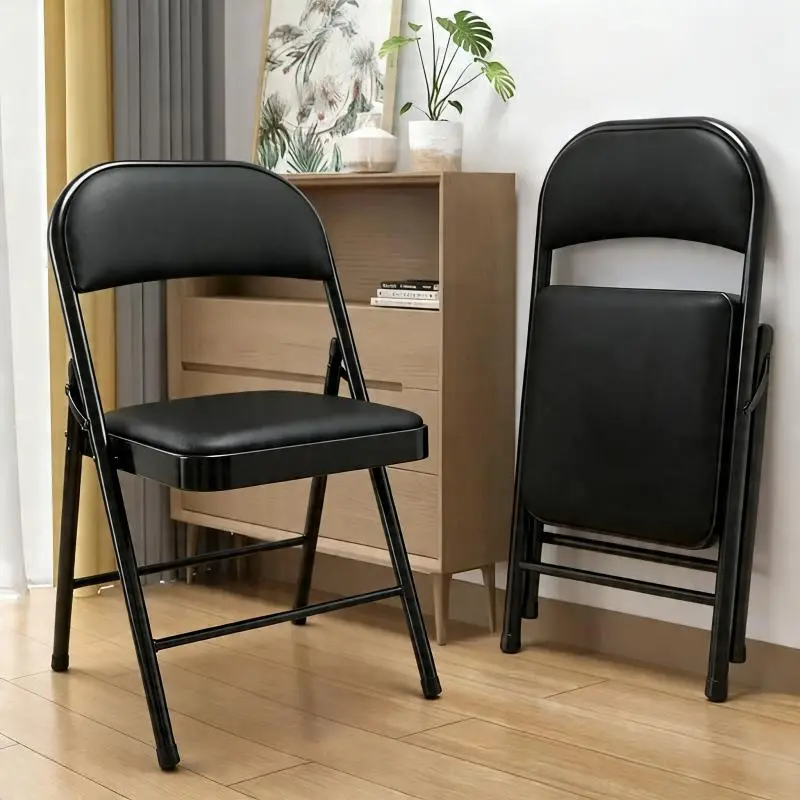 Foldable portable modern chair featuring leather padding and a sturdy metal frame; foldable for easy storage, suitable for indoor and outdoor office spaces.
