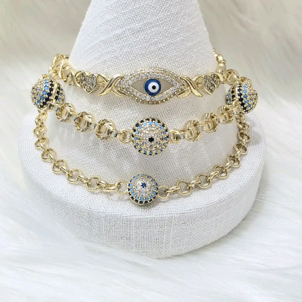 Variedad de Brazaletes de ojos estilo rolo y xoxo . Laminado 14k