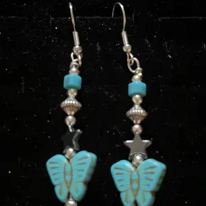 Navajo handmade sterling silver hook earrings featuring waterwash Turquoise, hematite, hogan beads, and sterling silver 3mm beads.