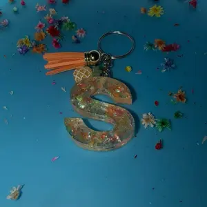 Resin Keychain Letter "S" with Tassel and Pineapple Charm Colorful Glitter Design for Stylish Accessories