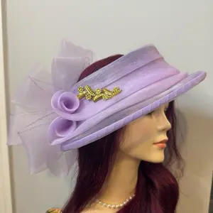 Elegant Woman Hat with Purple Bow and Gold Accent for Special Occasions