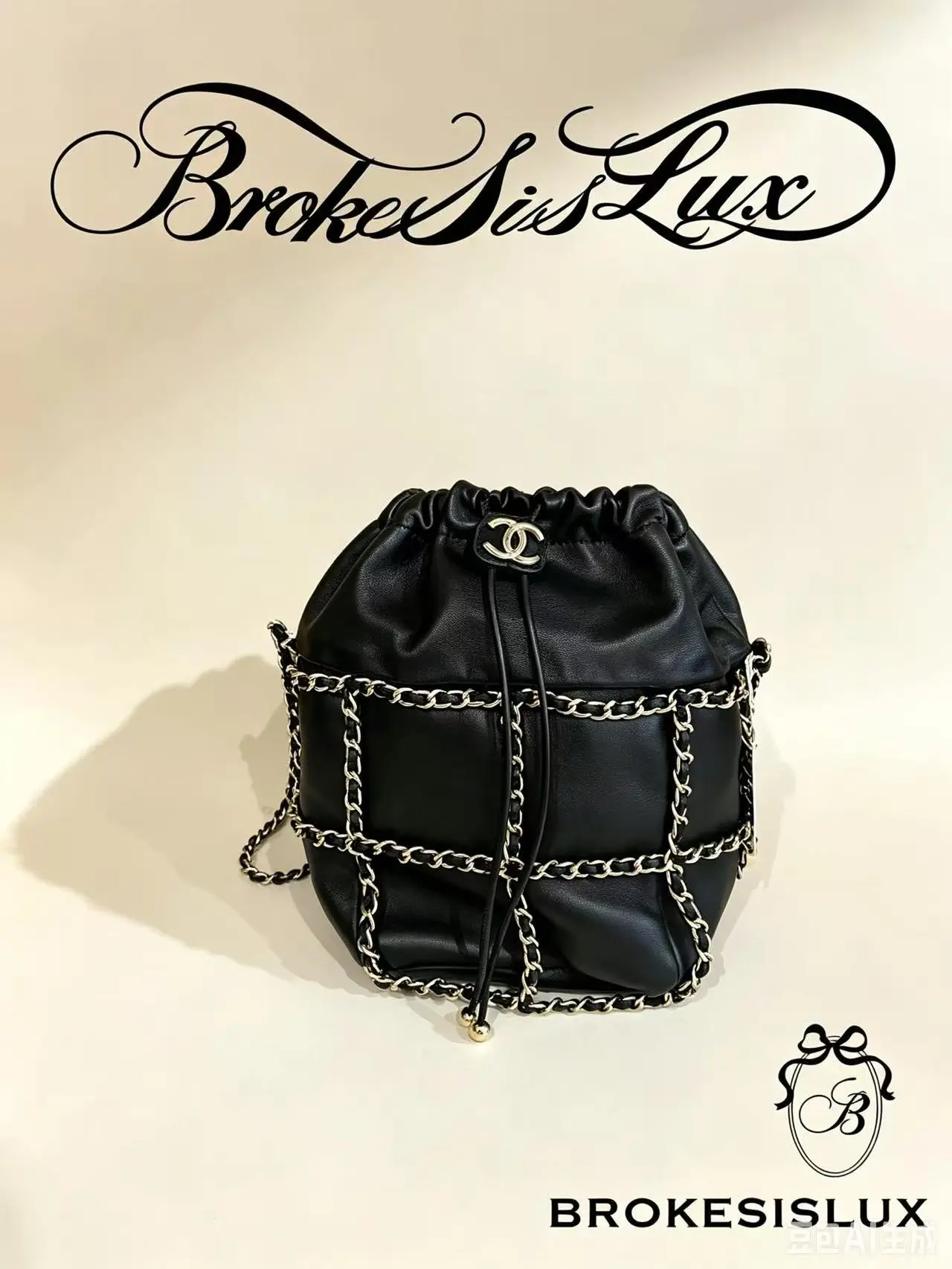 Pre-owned CHANEL Black Lambskin Chain Grid Drawstring Mini Bucket Crossbody Bag, Modern Casual Line