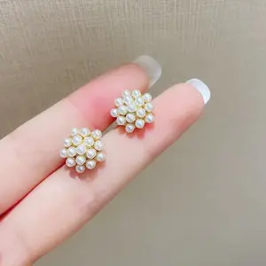 Stud Earrings with Gold Tone and Pearl Cluster Design