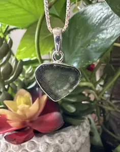 Authentic Moldavite Pendant with Necklace: A 2.7 grams genuine celestial gem, verified for authenticity. Embrace cosmic energies, deepen your spiritual connection, and leap to a transformation journey. Elevate your style and consciousness now.