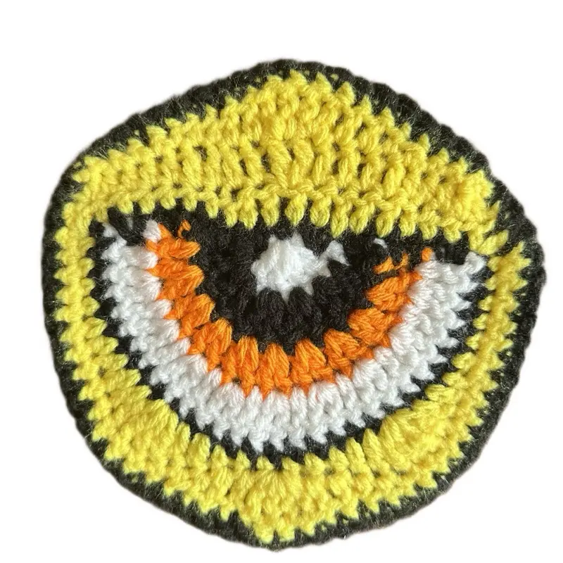 Eye Motif Crochet Patch - Handmade Decorative Piece with Yellow and Orange Colors, Featuring Eye Design and Black Outline