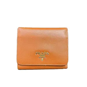 Pre-owned PRADA Leather Clutches & Wristlets Orange Saffiano Compact Wallet with Gold Tone Logo Hardware