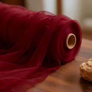 One large piece of romantic wedding tulle fabric, lightweight and sheer, with strong decorative appeal. Suitable for wedding arch decorations, ceremony backdrops, banquet setups, tent decorations, and other wedding-related scenes.