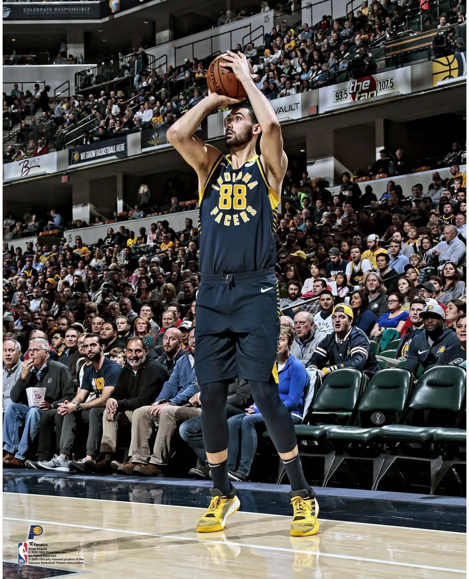Goga Bitadze Indiana Pacers Unsigned Shooting In Navy Photograph - NBA Memorabilia