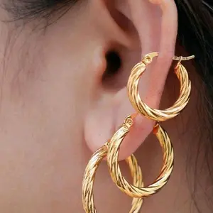 Set 3 Argollas S.Steel A Juego Para Tres Oyitos Gold-Tone Twisted Hoop Earrings for Stylish Elegance