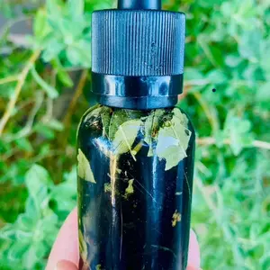 Black cat ritual oil