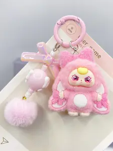 Popular bow flocking big ears cartoon keychain three-dimensional doll schoolbag pendant Fluffy Bunny Keychain