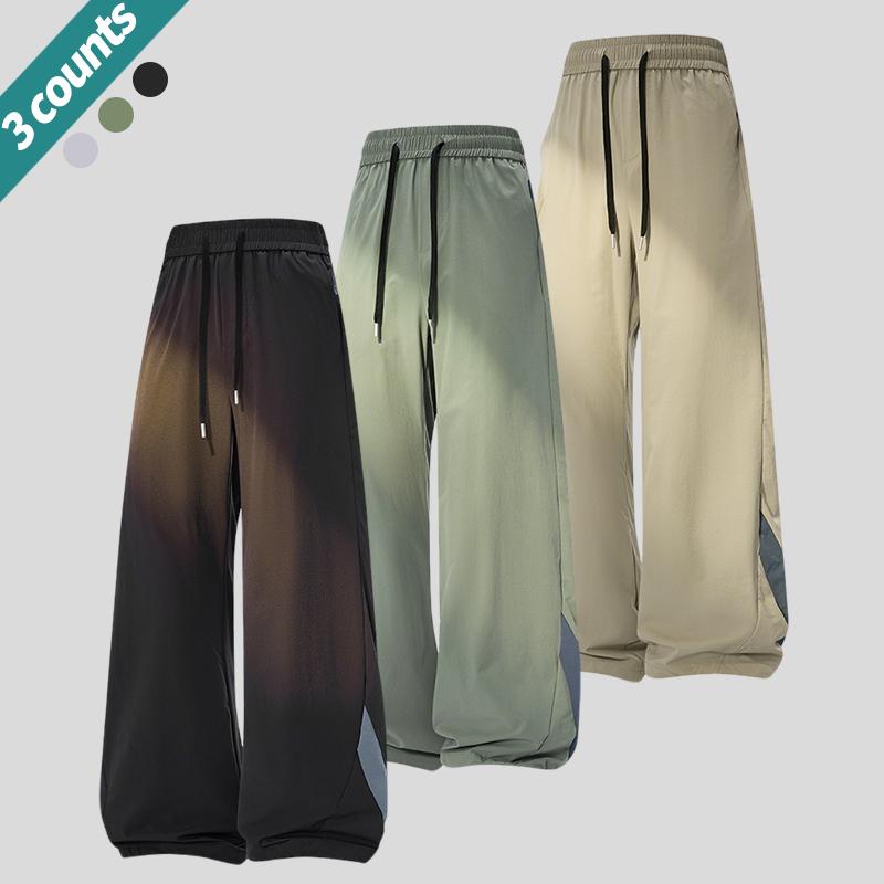 3-pack men’s loose casual pants with an adjustable elastic drawstring waist, suitable for the gym, training, and casual wear. Comfortable stretchy fabric, breathable material, loose fit—an essential for sports enthusiasts.