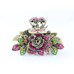 Antique bronze finish hair claw clip on a rose with pink stone petals