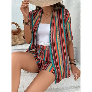 A two-piece set featuring a multi-colored bohemian print short-sleeved shirt and tie-down shorts, perfect for vacations and everyday wear, featuring a trendy beach style.