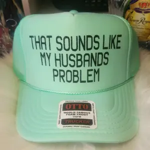Otto Brand THAT SOUNDS LIKE MY HUSBANDS PROBLEM TRUCKER HAT - Fashion Accessory with Black Glitter & Mint Green Color