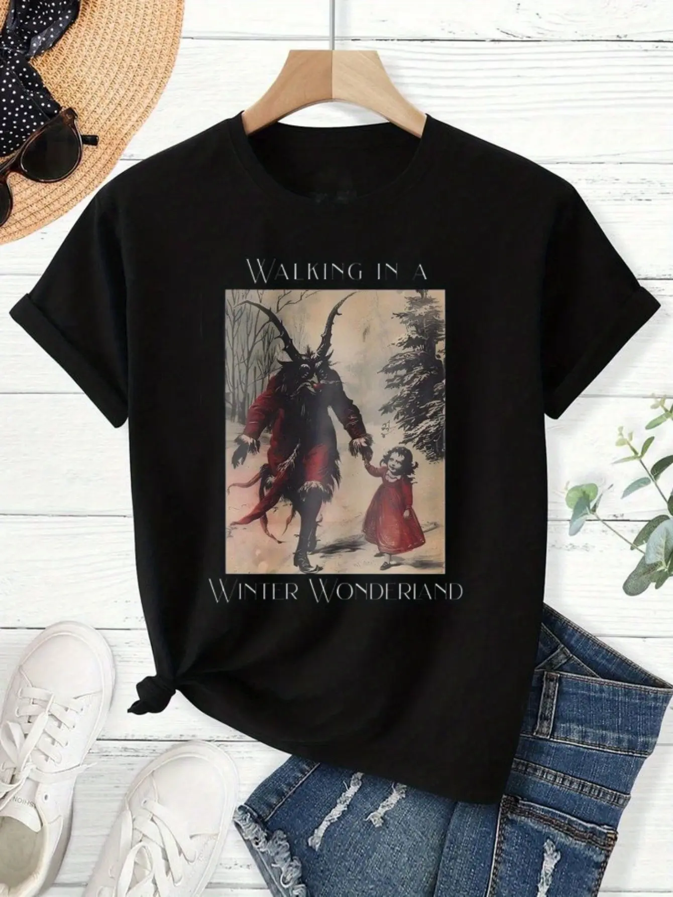 Black T-Shirt with Krampus and Girl Winter Wonderl unisex soft cotton short sleeve t shirt, vintage graphic casual tee for men women teens, perfect birthday holiday gift for camping travel gym daily street  wear