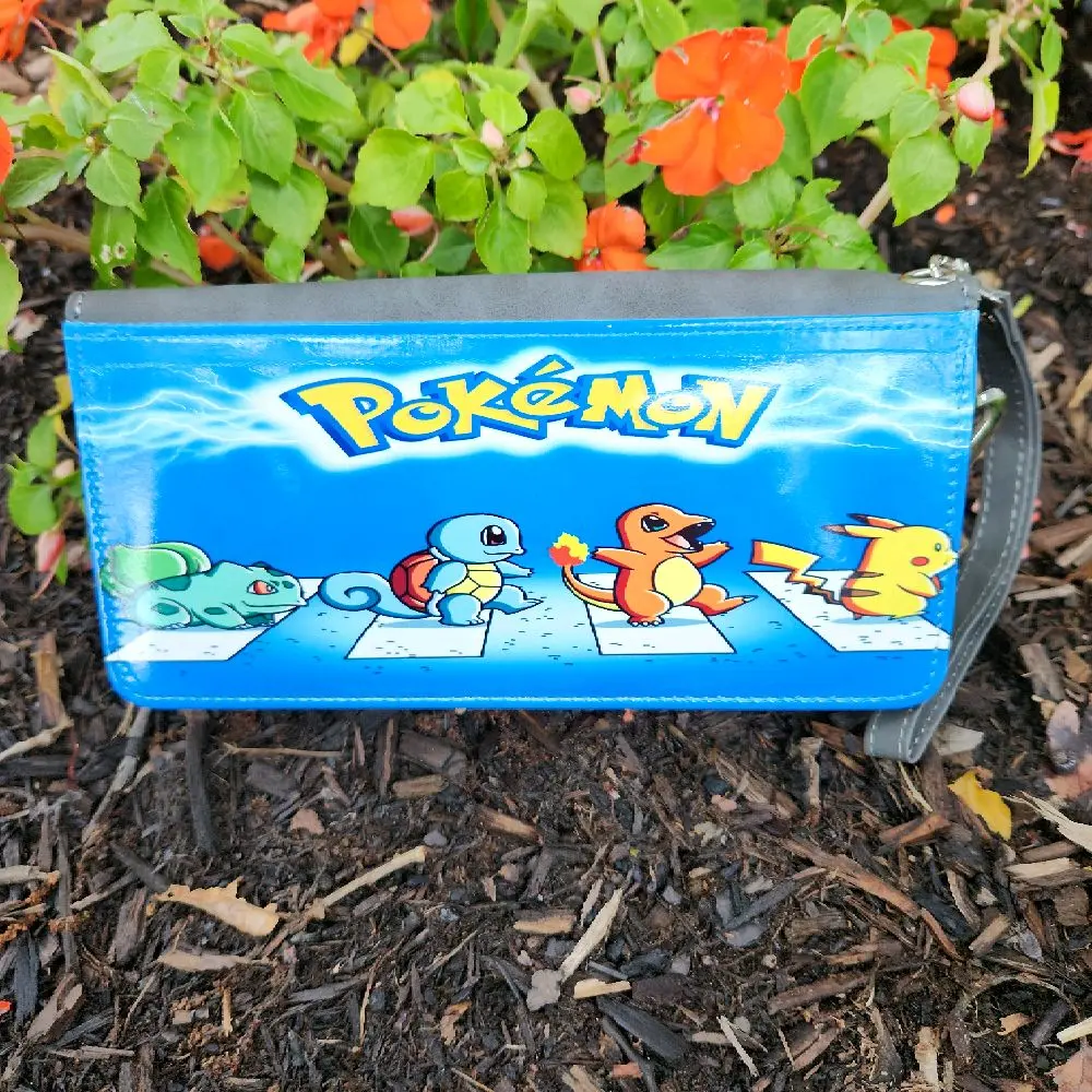 Pokémon Womens Black Leather Abbey Road Theme Wallet with Blue Design Featuring Iconic Characters