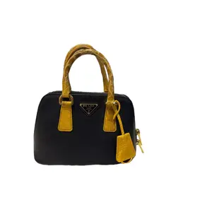 Pre-owned PRADA leather bag accessories Black/Yellow Saffiano and Croc Mini Promenade