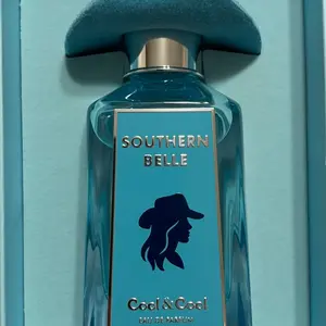 Southern Belle Cool & Cool Eau de Parfum - Blue Bottle with Silver Cap and Silhouette Design