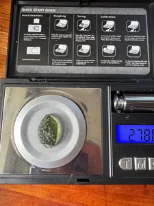 2.78 gram undamaged  Moldavite with open bubble