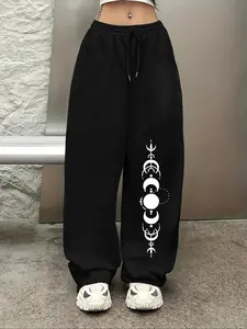 Moon phase sweatpants for my witchy soul 🌙 | Oversized black fit with celestial print—perfect for cozy nights and cosmic vibes 👖 | #MoonPhasePants #CelestialFashion #WitchyLoungewear
