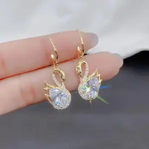 Set of Dangling Earrings for Women with Luxurious Golden Swan Shape and Synthetic Decoration - Shiny and Elegant, Ideal Gift for Daily Parties