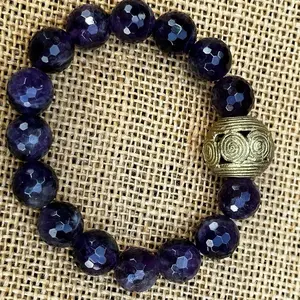 Gorgeous amethyst bracelet with Egyptian ornamental bead