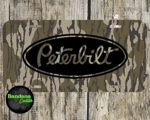 [ CAMO NATION ] Bottomland Camo Peterbilt Logo Vehicle Tag - Old School Hunting Style Aluminum License Plate - Rugged Semi-Truck Accessories - Gift for Peterbilt Driver & Hunter