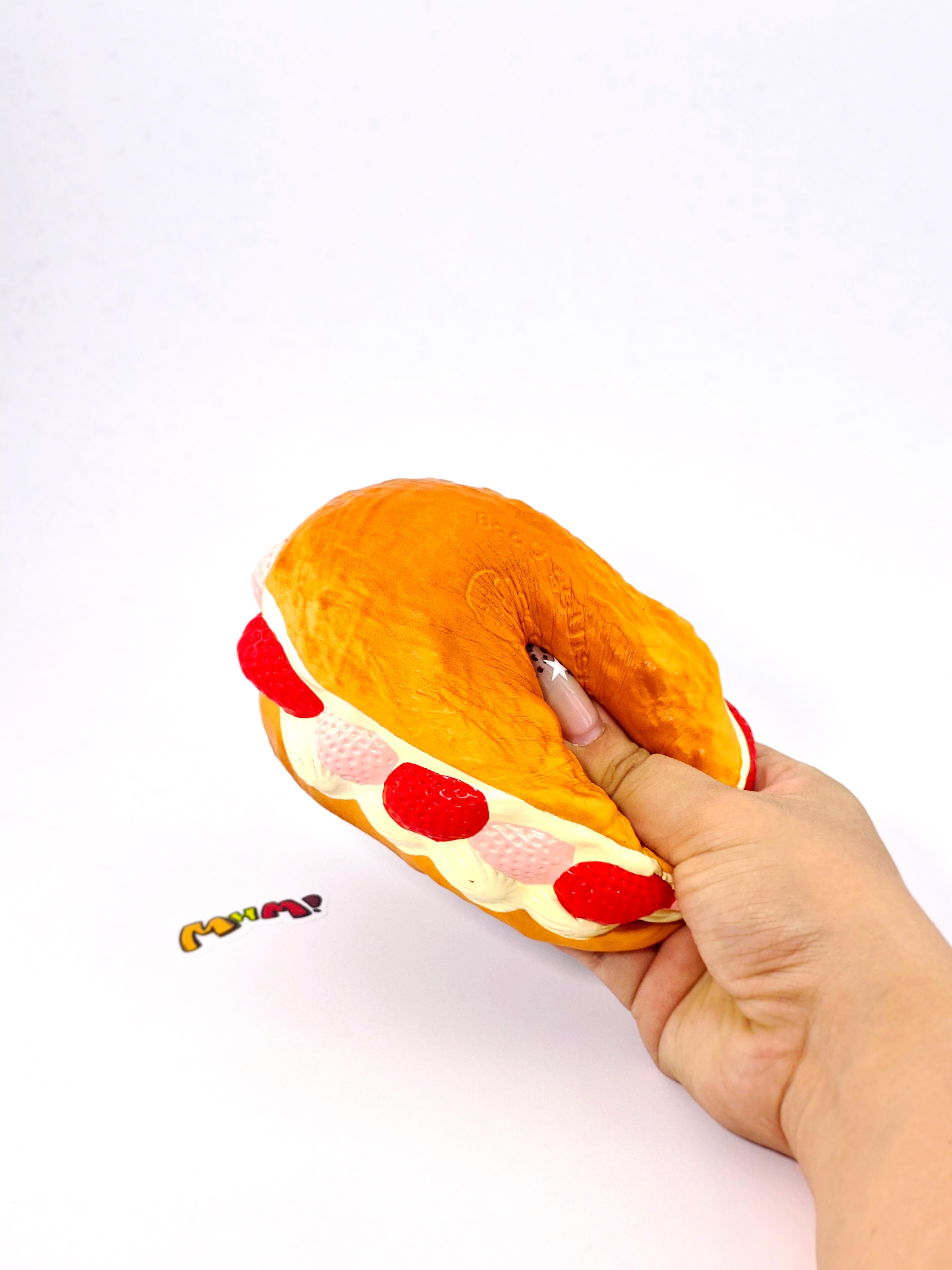 MHM Squishy Pink Strawberry White Cream Bread scented stress relief toy features a sticky, wet-soft, slow-bounce pastry texture for tactile fun