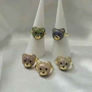 Variety of gold-plated rings with cute bear designs in different colors and sizes. High-quality plating, hypoallergenic.