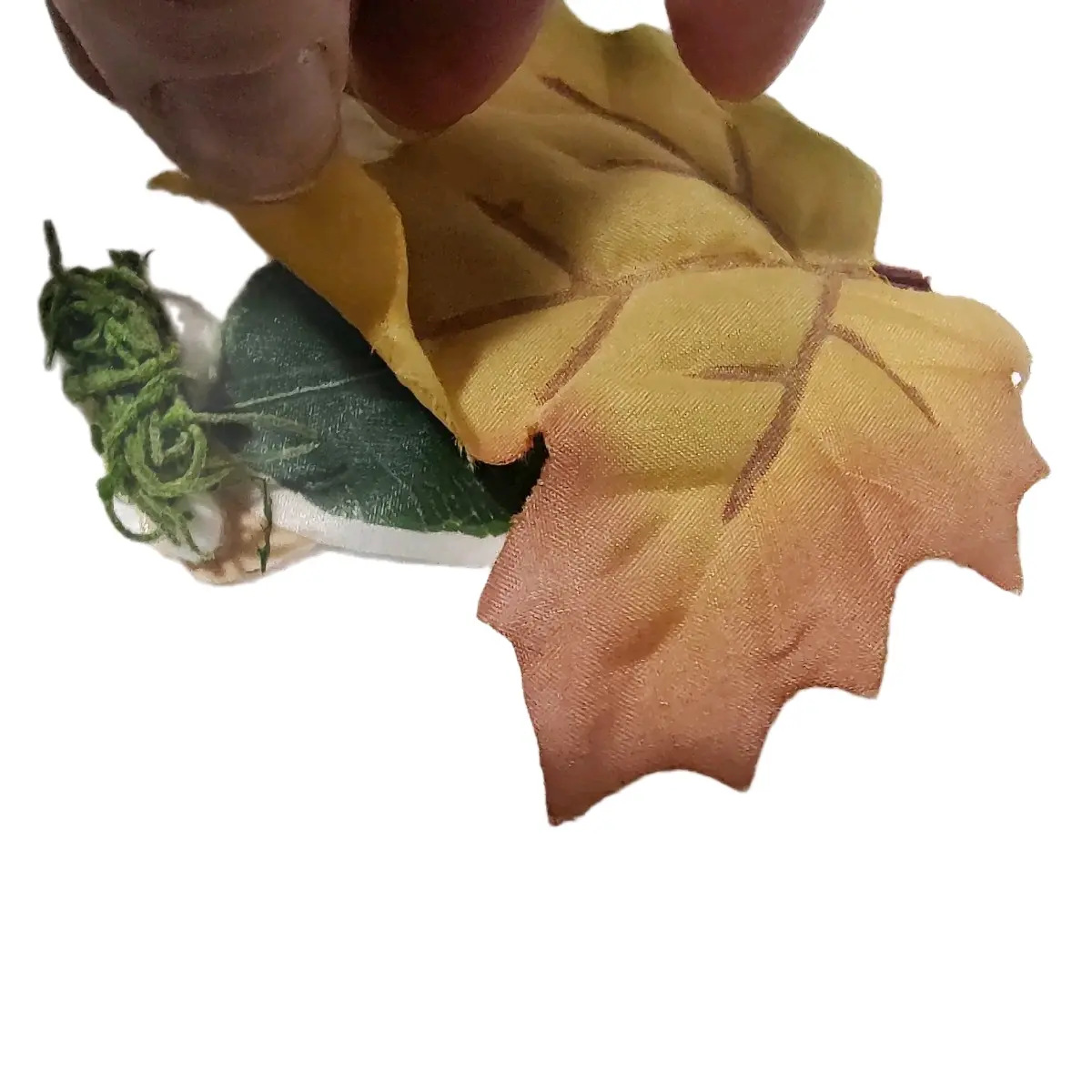Handcrafted miniature fairy bed for dioramas, dollhouses, fairy garden's, and miniature displays.