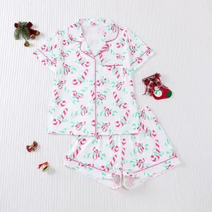 Women’s Christmas candy vine print casual pajama set with pocket details, featuring a collared short-sleeve top and matching shorts, suitable as vacation home wear