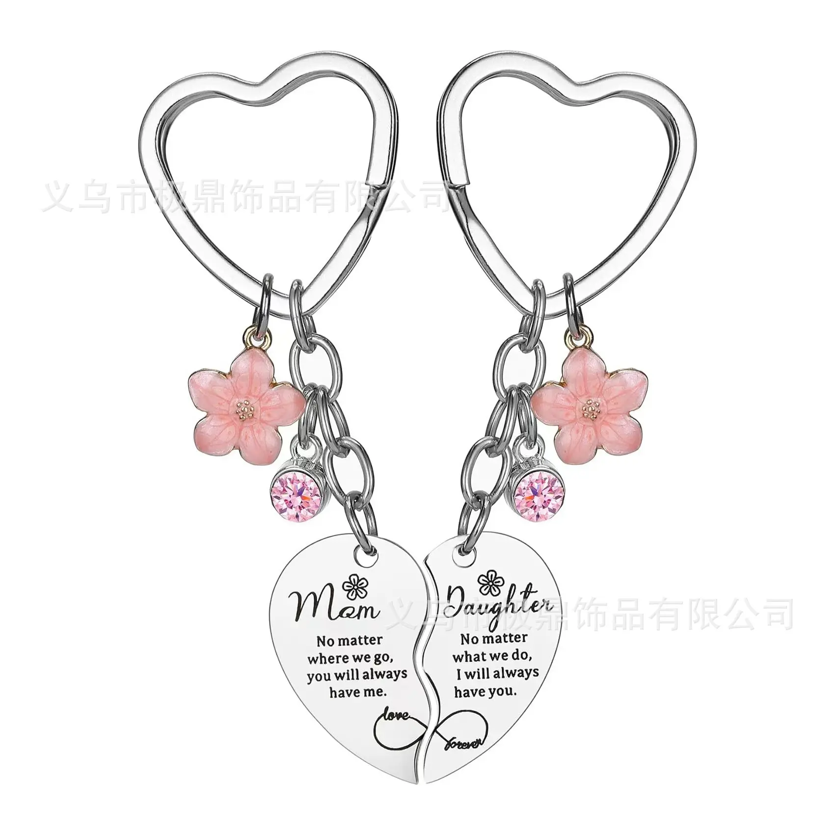 A pair of pink diamond heart shaped keyc