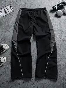 Men’s black-and-gray color-block athletic pants — Spring/Summer 2026 new model featuring side stripes, drawstring, and a loose casual fit; American retro high-street athletic pants; men’s black-and-gray color-block drawstring jogger sweatpants #Y2KMenswea