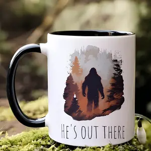 1 11 ounce thermos with Bigfoot Forest design and "HE's OUT THERE" text - camping, hiking, home use - perfect Bigfoot enthusiast Christmas gift, outdoor drink | comfortable and beautiful cup | insulated drink