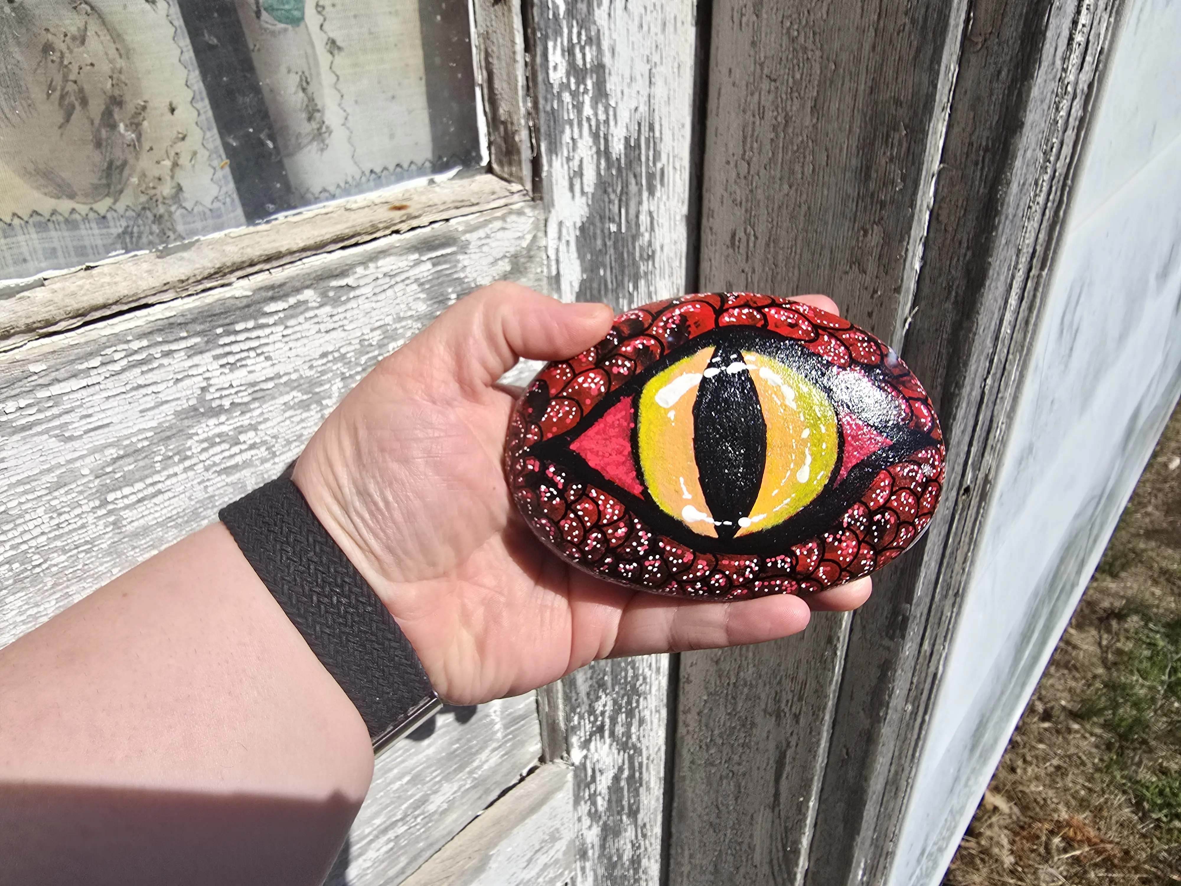 Red Dragon Eye Painted Rock