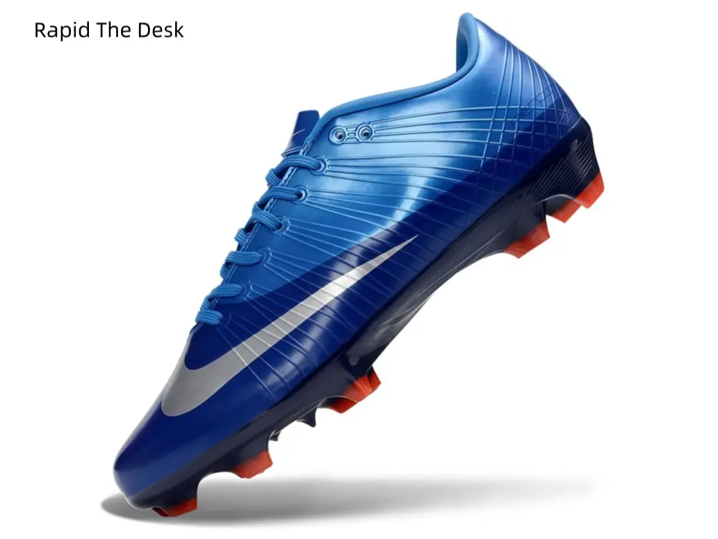 Blue speed boots with orange studs for natural grass dominance.