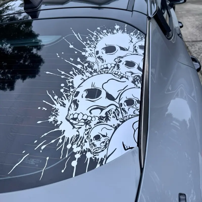 Skull Splatter Decal - Bold  Graphic for Cars Trucks Jeeps - Durable Weather-Resistant Vinyl - 16" to 35" Sizes - Gothic Horror Street Art Design - Easy Apply Remove - Car Wash Safe - Multiple Skulls Decal