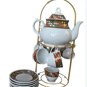 Habesha Coffee and Tea Set with Decorative Teapot Cups and Plates on Gold Rack (14pie)