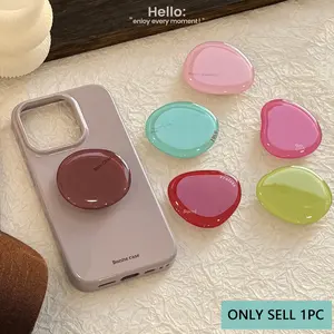 1PC unique and creative phone stand with an adhesive, retractable airbag design. It attaches to your phone case and is suitable for flat and smooth surfaces such as plastic, metal, glass, and wood. Free your hands and make a perfect gift recommendation.