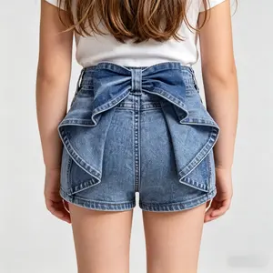 Cute girls’ denim shorts featuring a large bow at the back—fashionable summer denim shorts suitable for children.