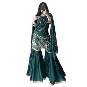 Elegant deep green garara suit in a deep, royal shade  Beautiful flow with delicate work, perfect for weddings, Eid, and special events.
