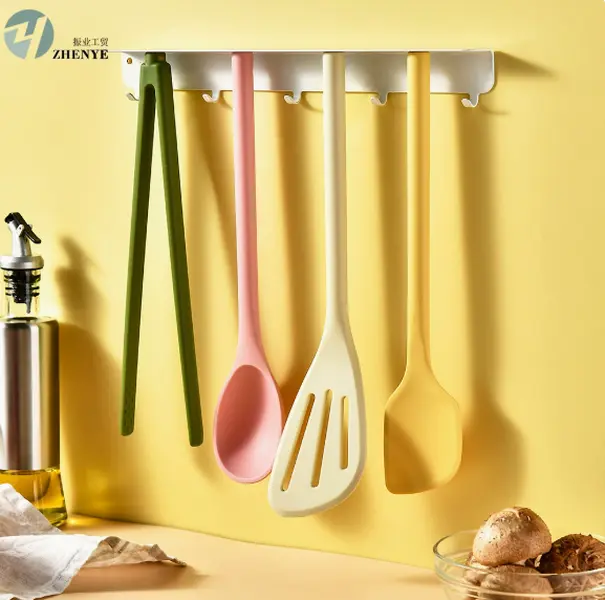 Complete silicone kitchen utensil set including tongs, soup spoon, slotted spatula and scraper. Heat-resistant, flexible and non-stick friendly, perfect for daily home cooking and frying meals.