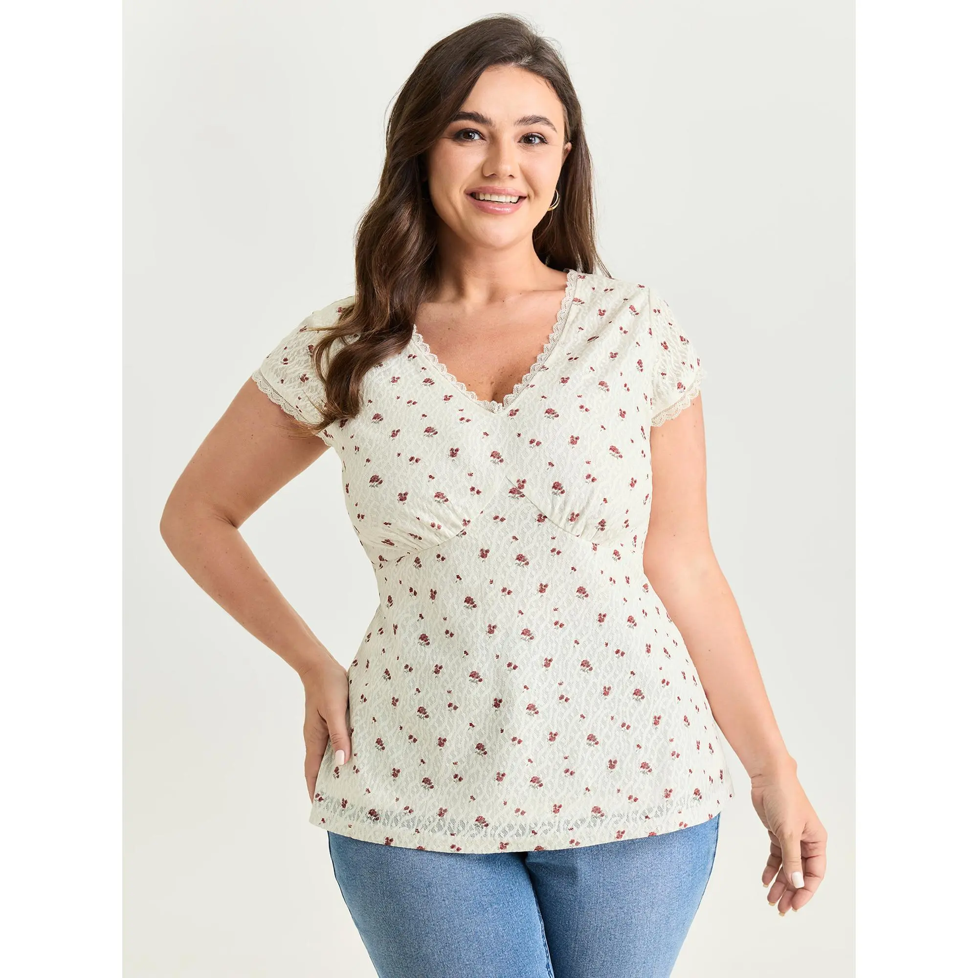 BloomChic Women's Plus Size Romantic Ditsy Floral Spandex Knit Shirts - V-Neck Cap Sleeve Cropped Top with Patchwork Trim, Fitted Shape Original White Polyester Blend Elastane Premium Fabric Women's Tops