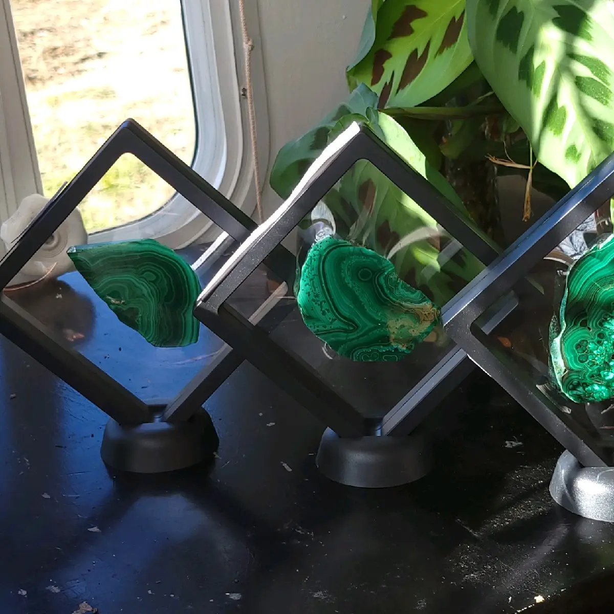 Framed malachite and chrysocola slab with stand