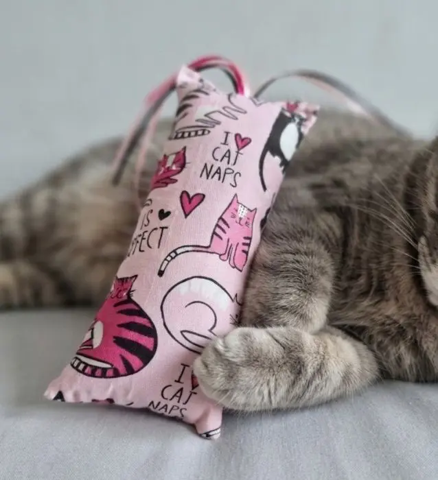 pink naptime Cat-nip cat kicker toy stuffed with fluff & w/ ribbons for fur baby