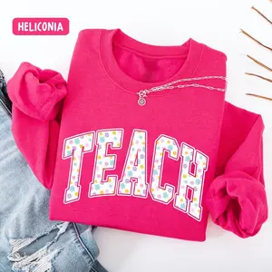 Pastel Floral Teach Easter Teacher Shirt, Playful Spring Educator Graphic Tee, Aesthetic Elementary Teacher Team Outfit, Trendy Oversized School Holiday Design, Premium Garment Dyed Easter Day Gift